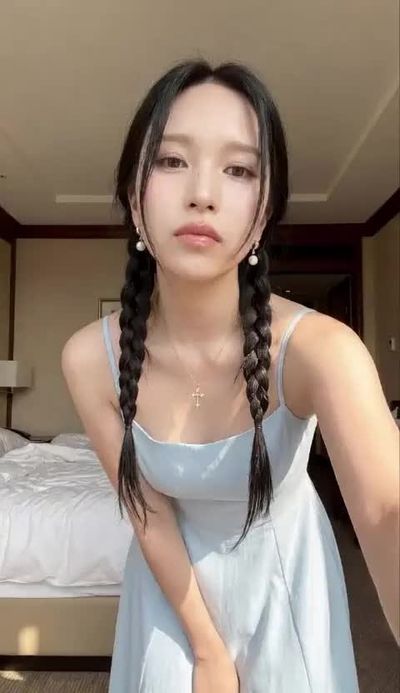Mina - shows tits